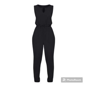 Prettylittlething Black V Neck Tie Waist Rib Jumpsuit